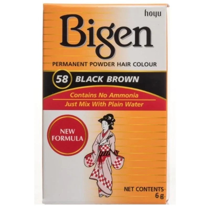 A box of Bigen 58 Black Brown Permanent Powder Hair Colour, featuring a white and orange design with a red banner and an illustration of a woman in a kimono.